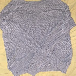 It’s a sweater shirt it’s light grey the brand is ICON APPAREL